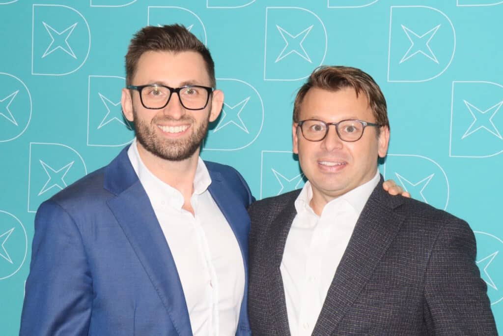 Alexandru Ciucu and Bogdan Ciucu, smiling