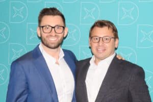 Alexandru Ciucu and Bogdan Ciucu, smiling